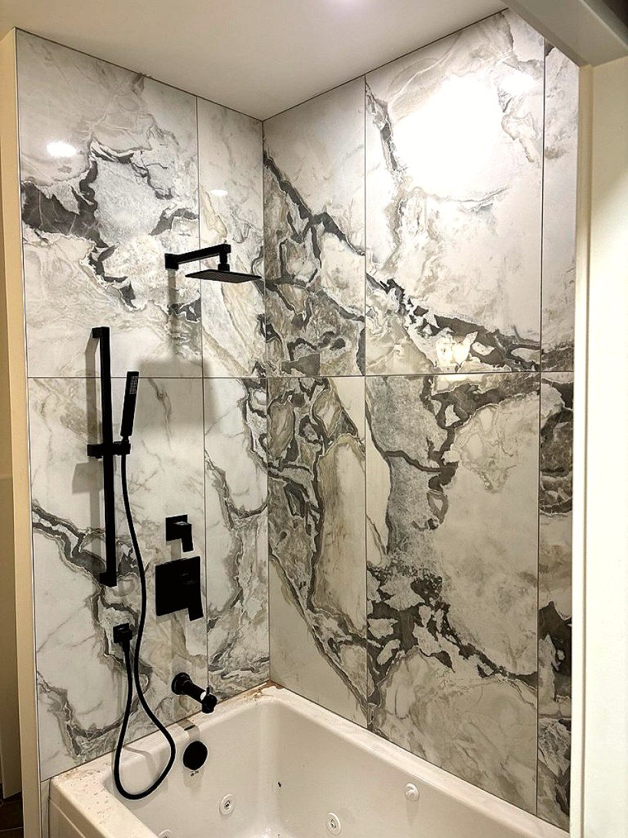 Marble tub & rain shower